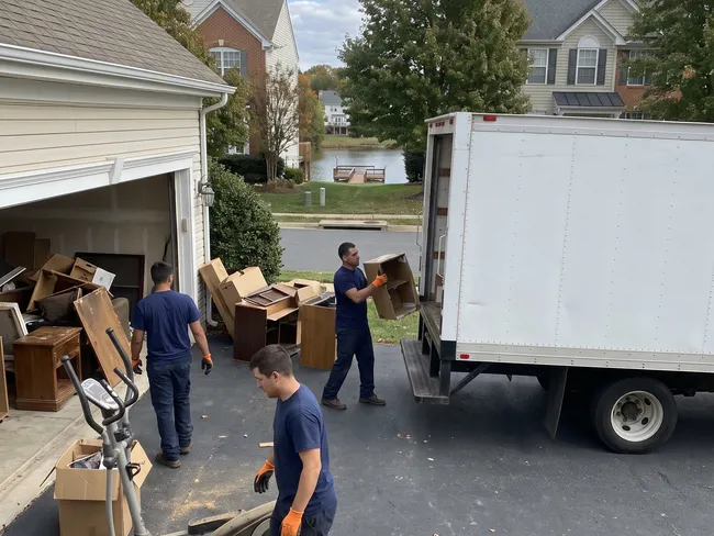 Junk removal crew at a home in Montclair, VA