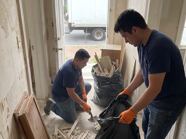 Junk removal crew at a home in Occoquan, VA