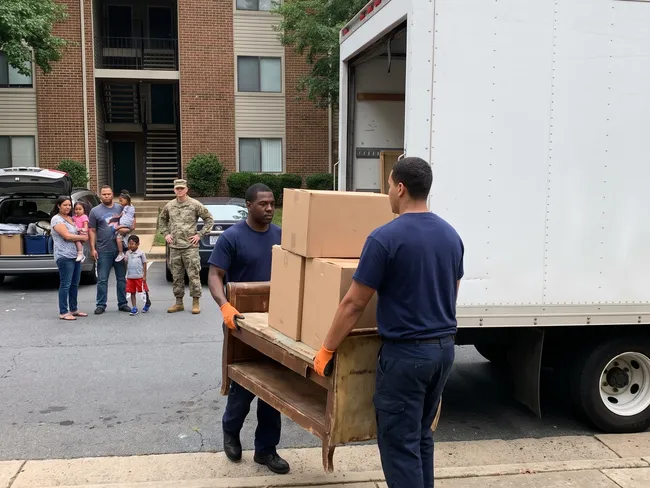 Junk removal crew at a home in Triangle, VA